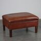 Leather ottoman in classic English style finished with decorative nails