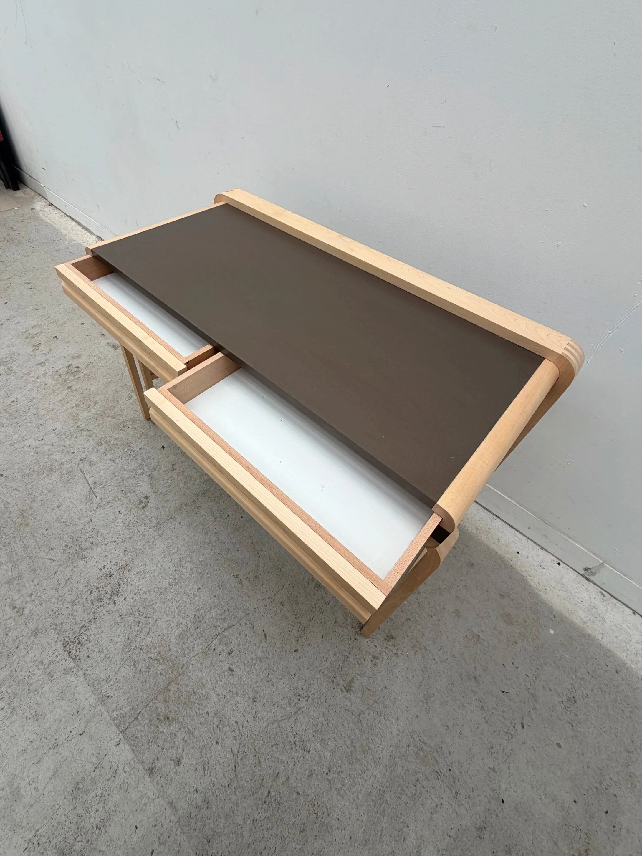 Solid wood and formica desk made by a cabinetmaker.