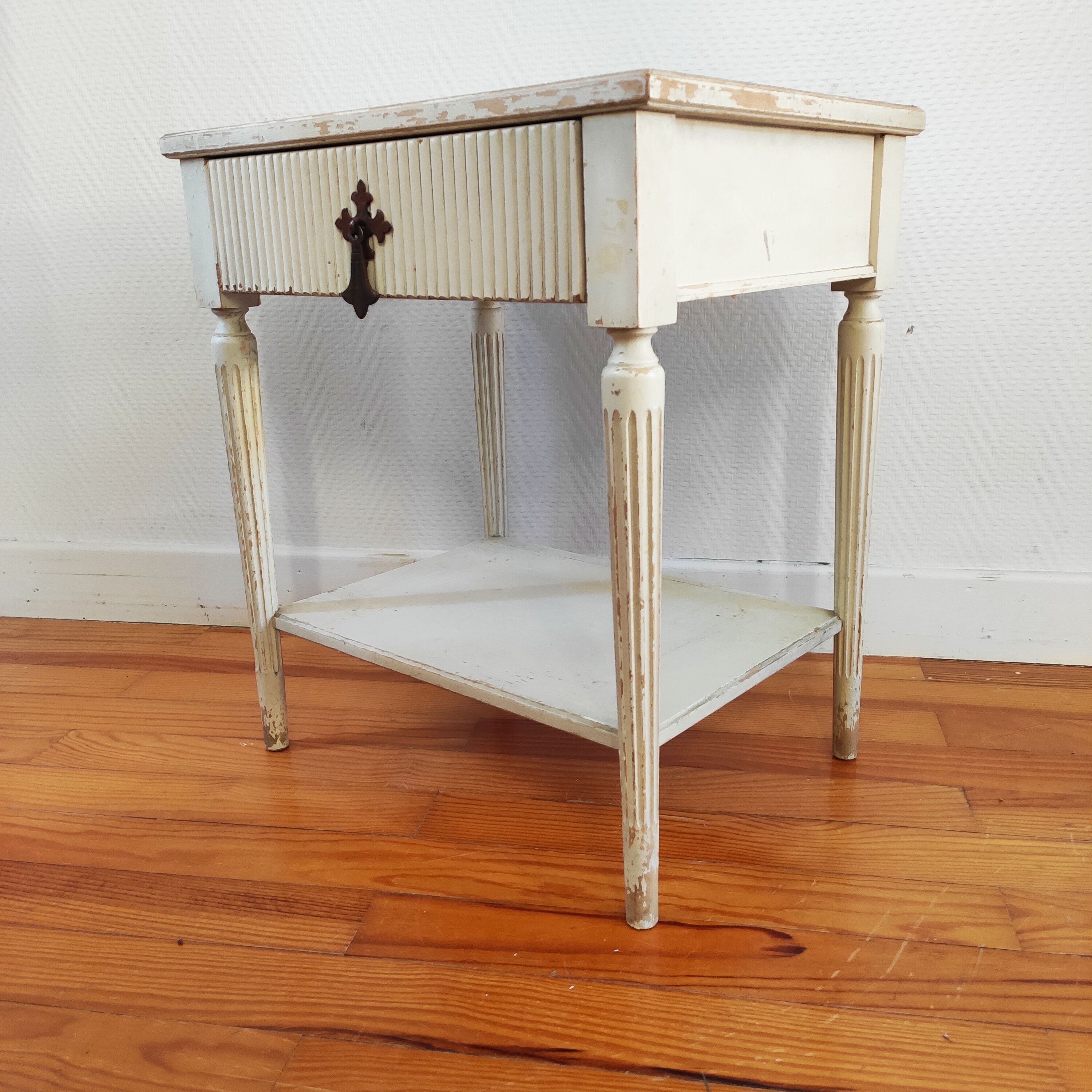 Patinated sofa end bedside