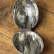 Nutcracker, shaped like a large nut, silver-plated metal