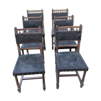 Henry II pushed back leather chairs