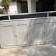Grey lacquered wooden bar cabinet, golden brass bar
