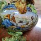 polychrome faience cup – Decorated with fantastical characters and animals