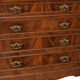 Antique Napoleon III commode in flame mahogany, with a white marble top.