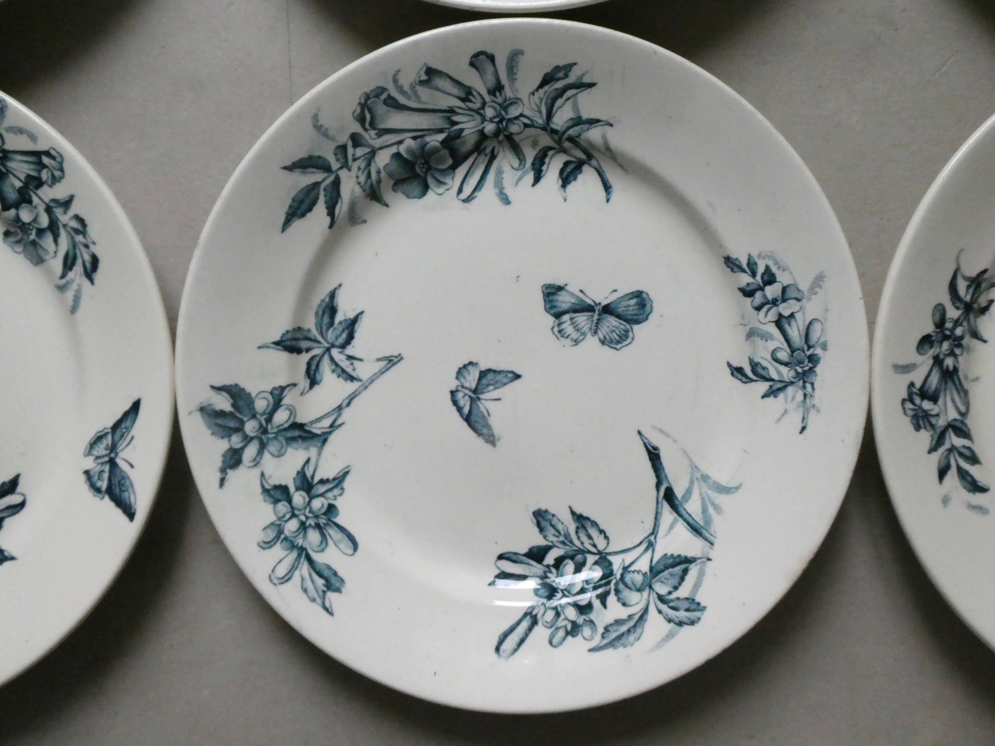 6 assiettes plates Badonviller, papillons et fleurs, 1900
