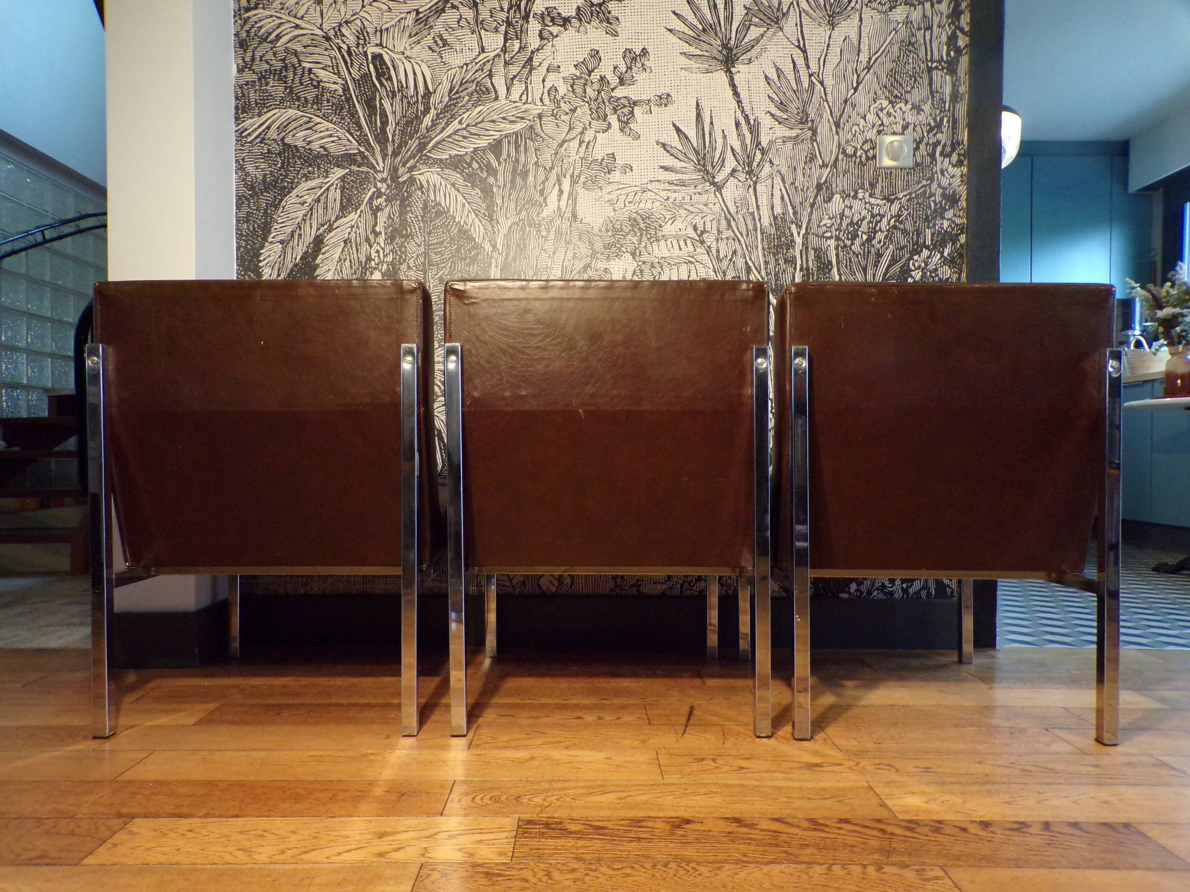 Trio of vinco armchairs in imitation leather