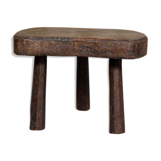Tabouret brutaliste tripode en bois massif