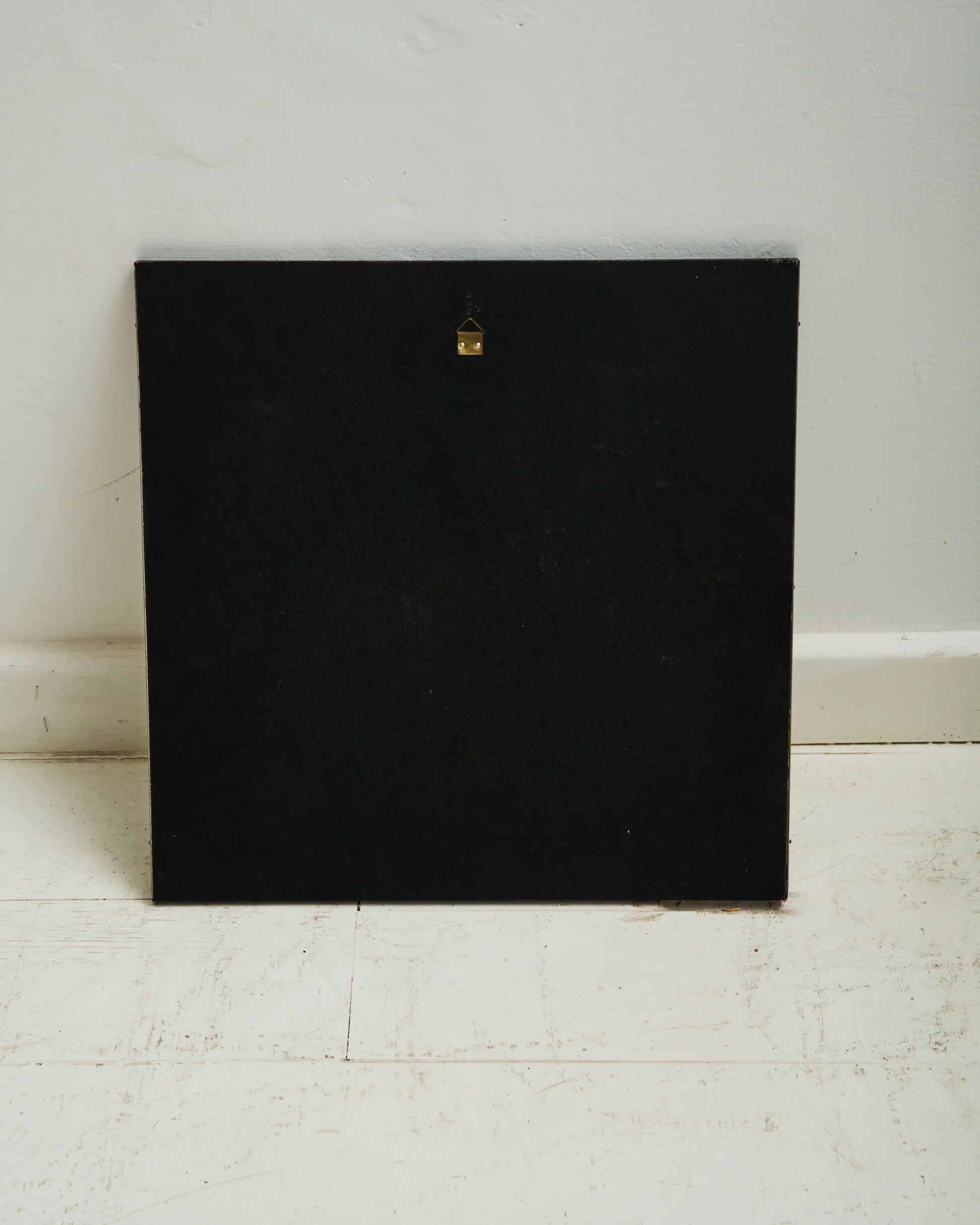 Round mirror with a square brushed aluminium frame, 1970-1980.