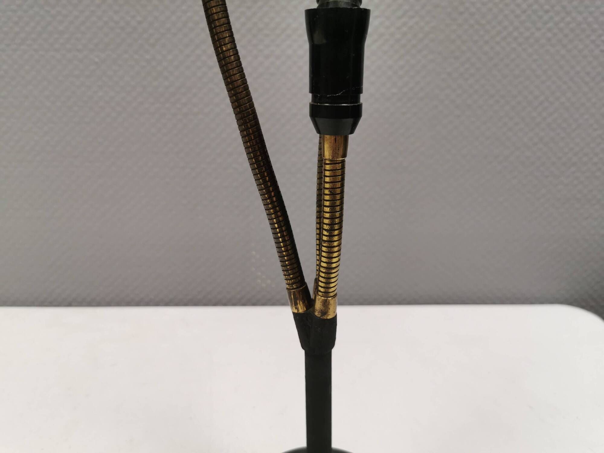 Old cast iron table lamp with brass bend and 3 light sources