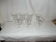 Lot of 7 antique stemmed glasses.