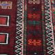 Hand-knotted rug of 308x210cm in oriental style with mainly red colours