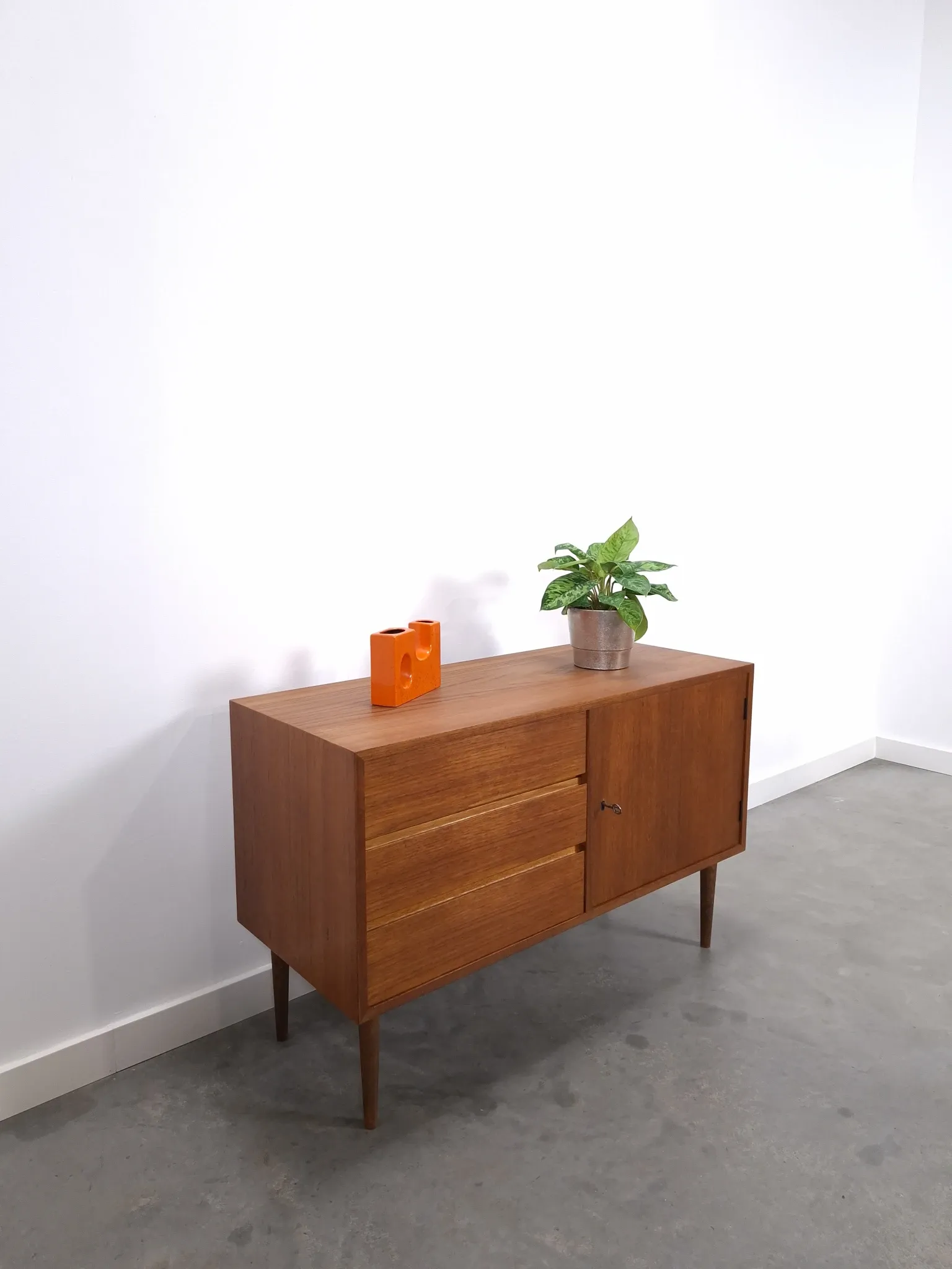 Vintage teak cabinet from the 1960s, sideboard with 3 drawers and a door.