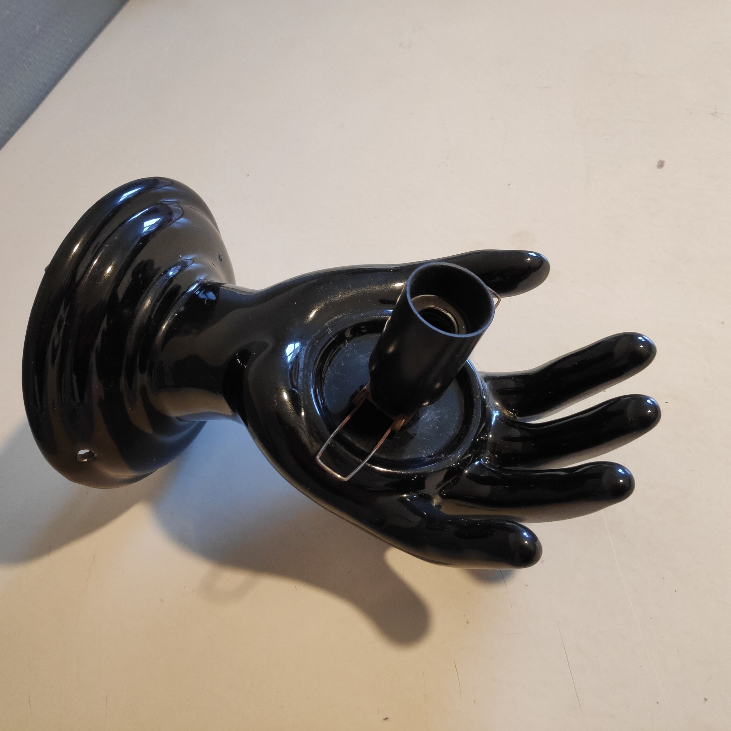 Black ceramic handand white opaline ball sconce