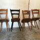 Set of 4 mismatched vintage chairs compass legs