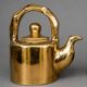 Golden ceramic teapot, model "Charlotte" by Kühn Keramik.
