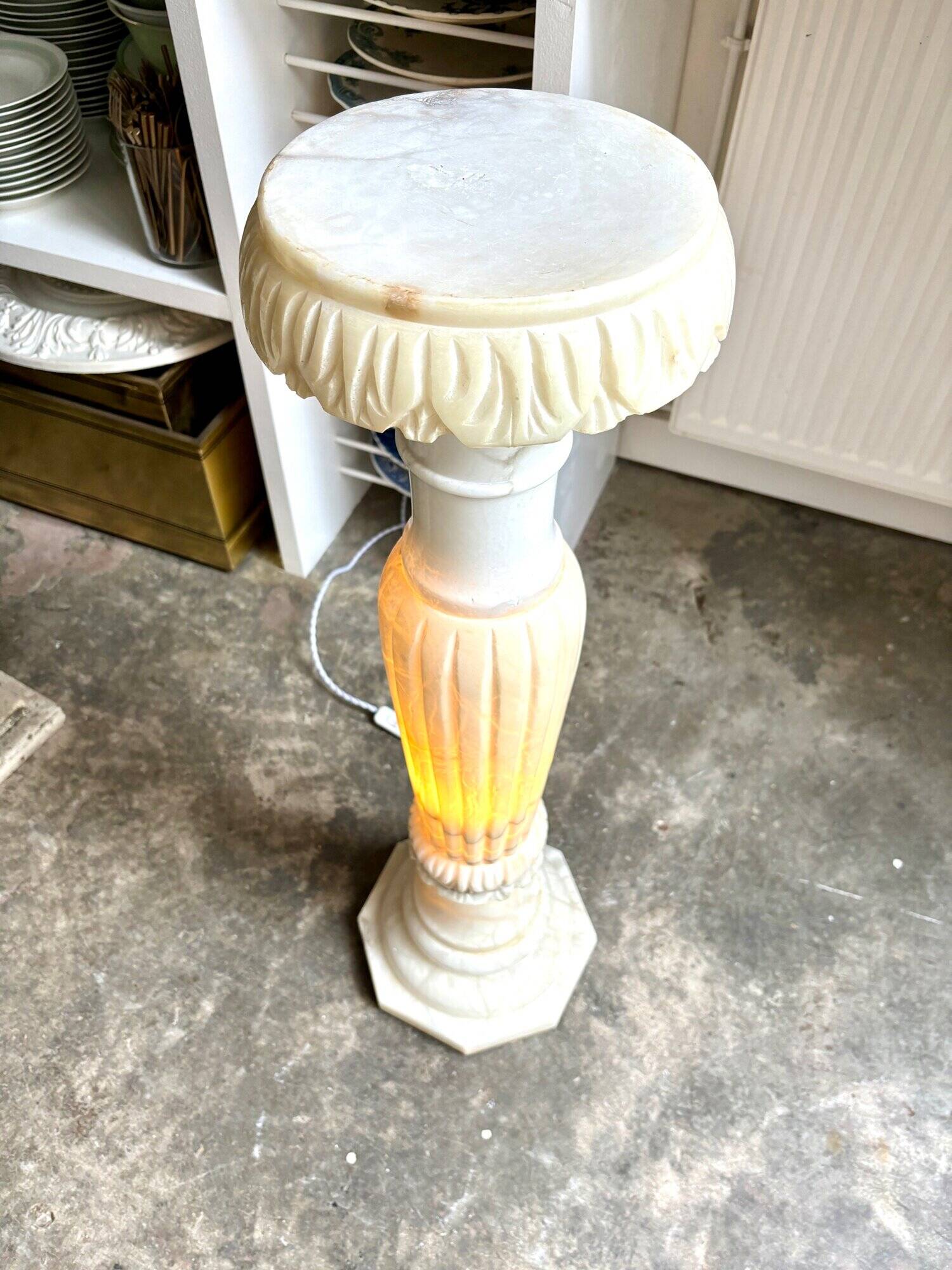 Column, illuminated alabaster saddle