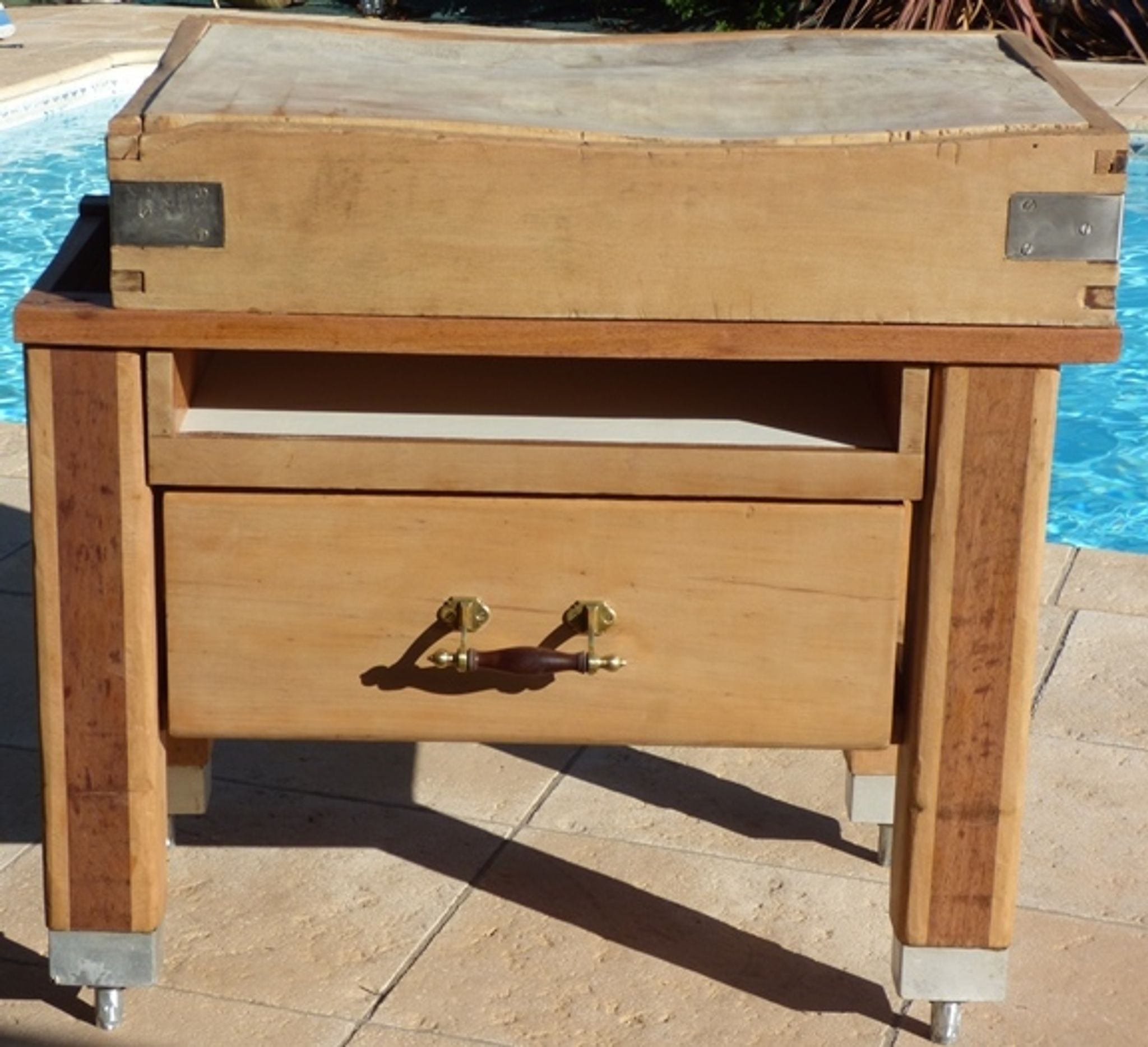 Butcher's log cabinet with two drawers and location for kitchen utensils