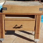 Butcher's log cabinet with two drawers and location for kitchen utensils