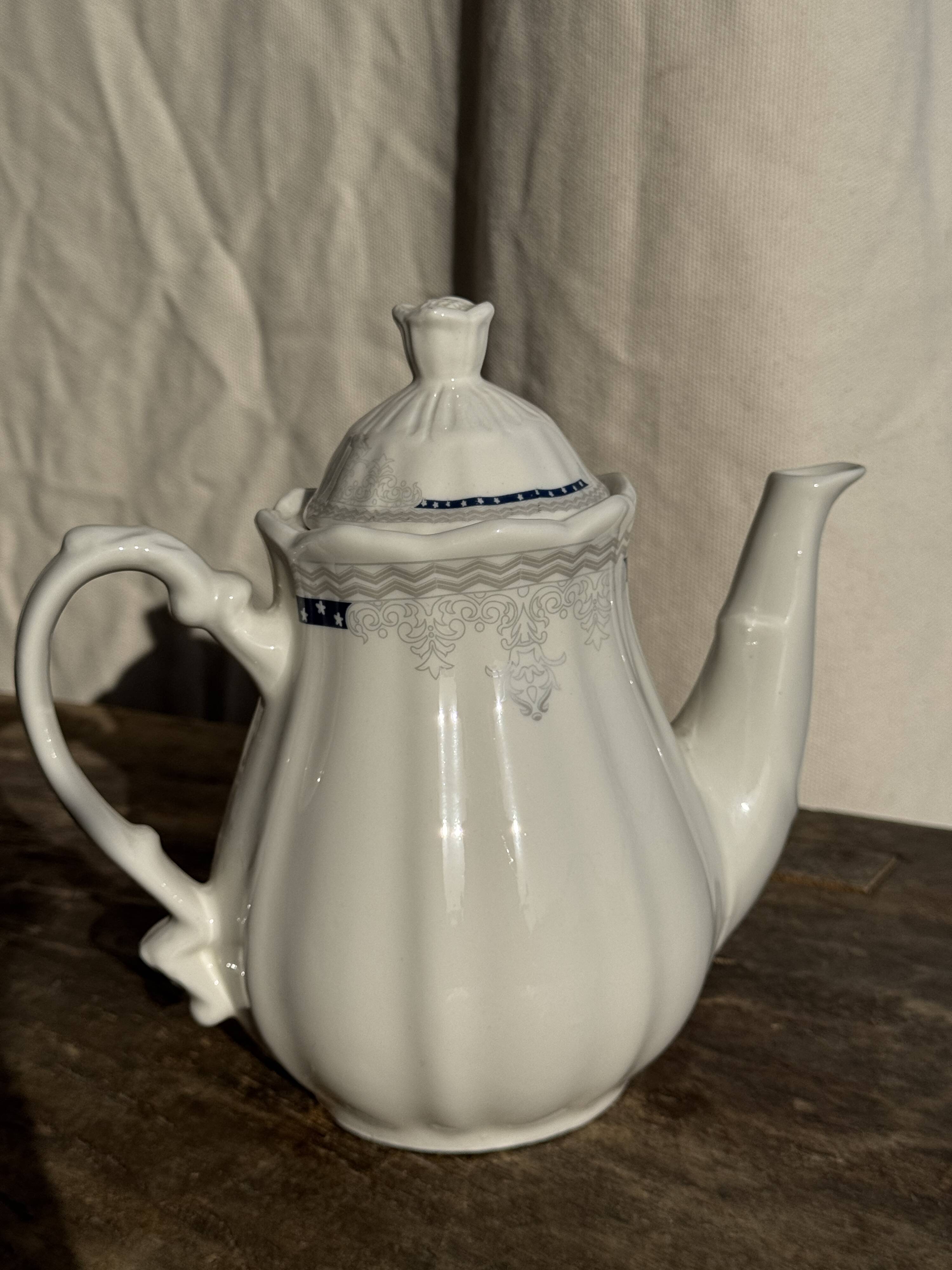 White earthenware teapot with blue and silver trim H22.5