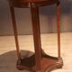 Varnished round gueridon