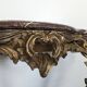 Console Louis XV en bois doré sculpté dessus marbre rouge