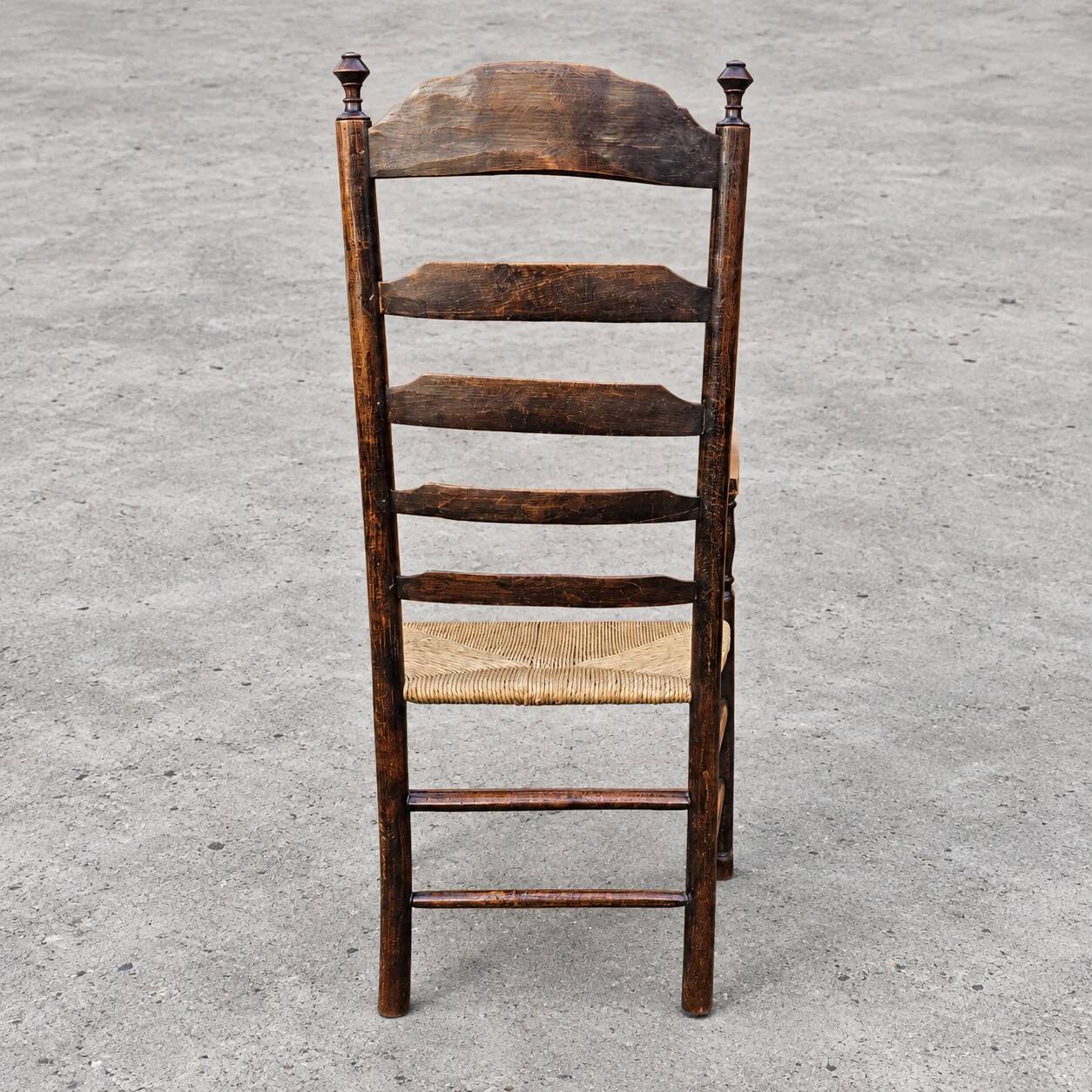 Early 20th century handcrafted and carved highback / ladder back chairs /