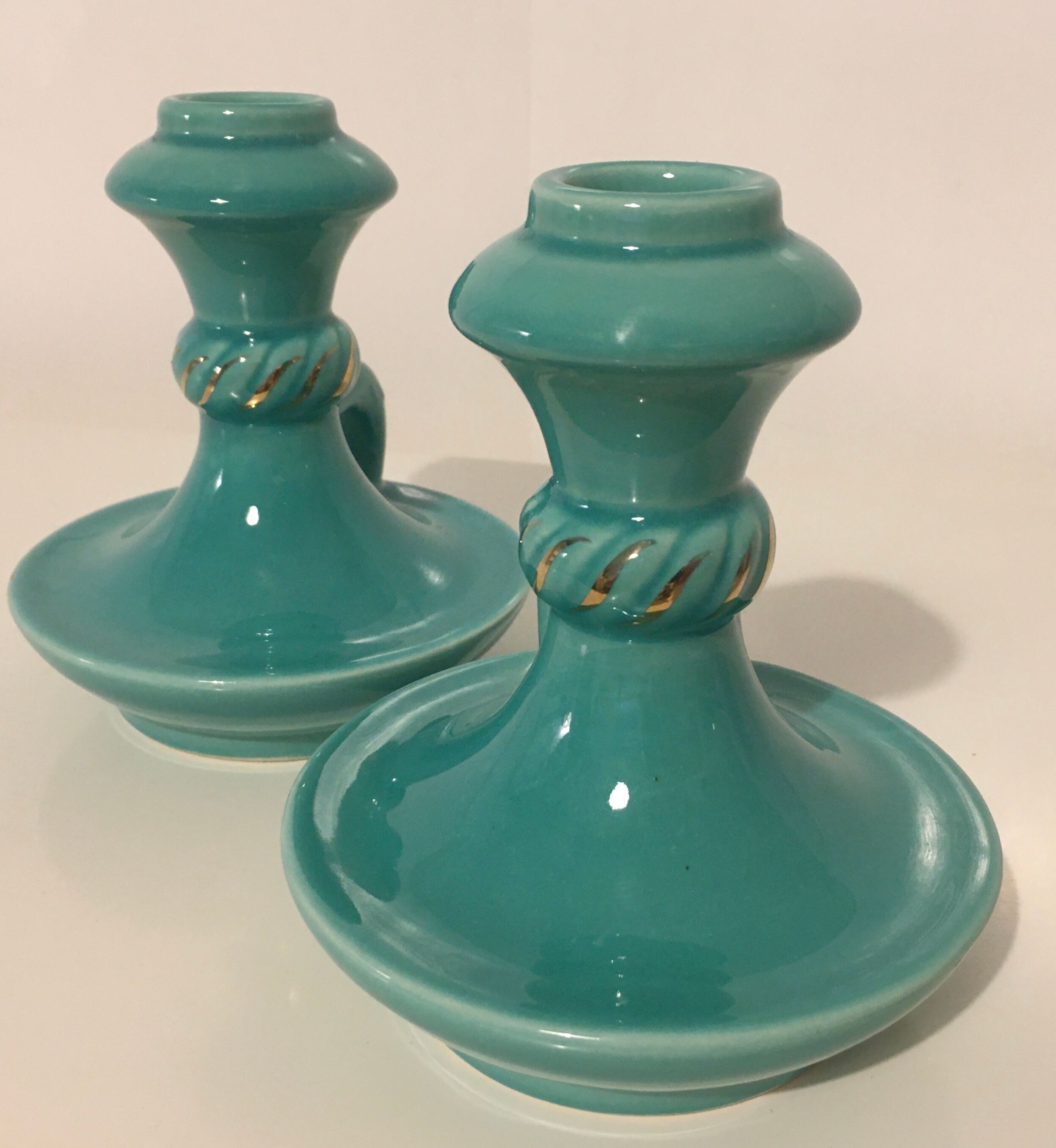Pair of turquoise ceramic candlesticks