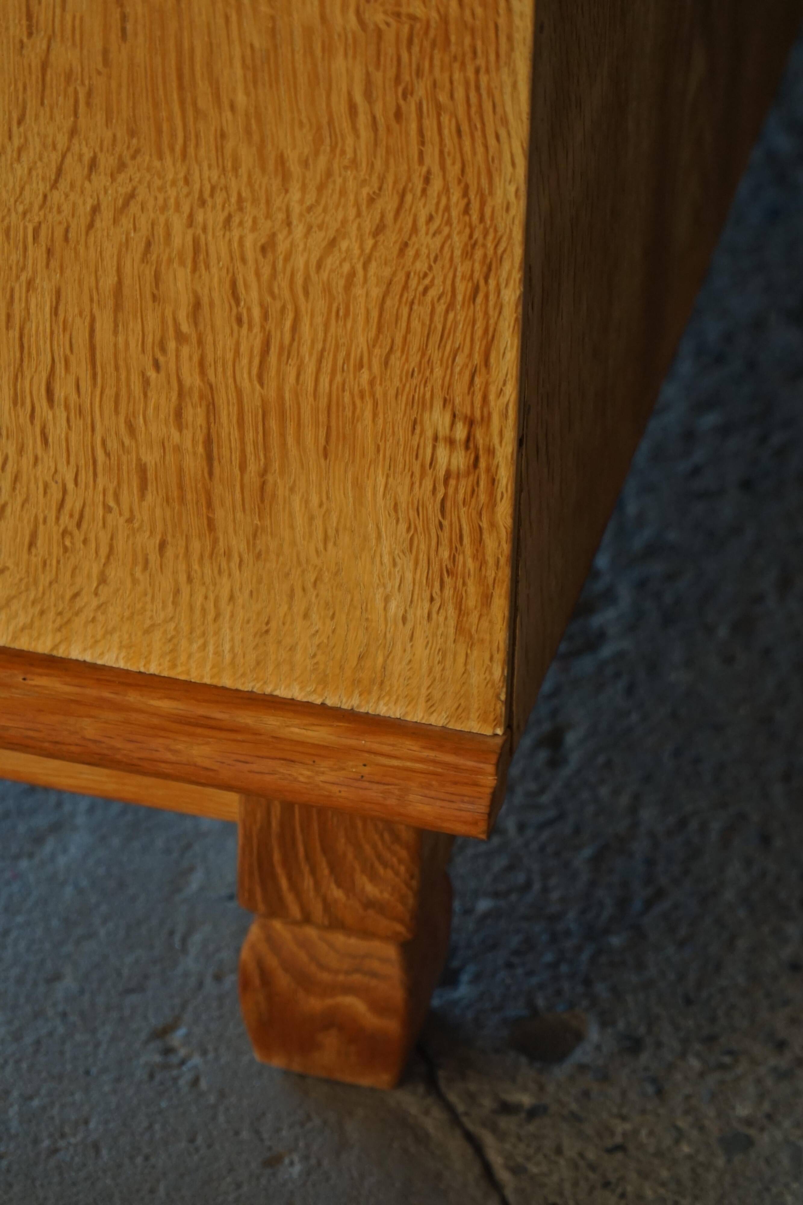 Modern Danish low enfilade in oak with panelled doors, mid-20th century.