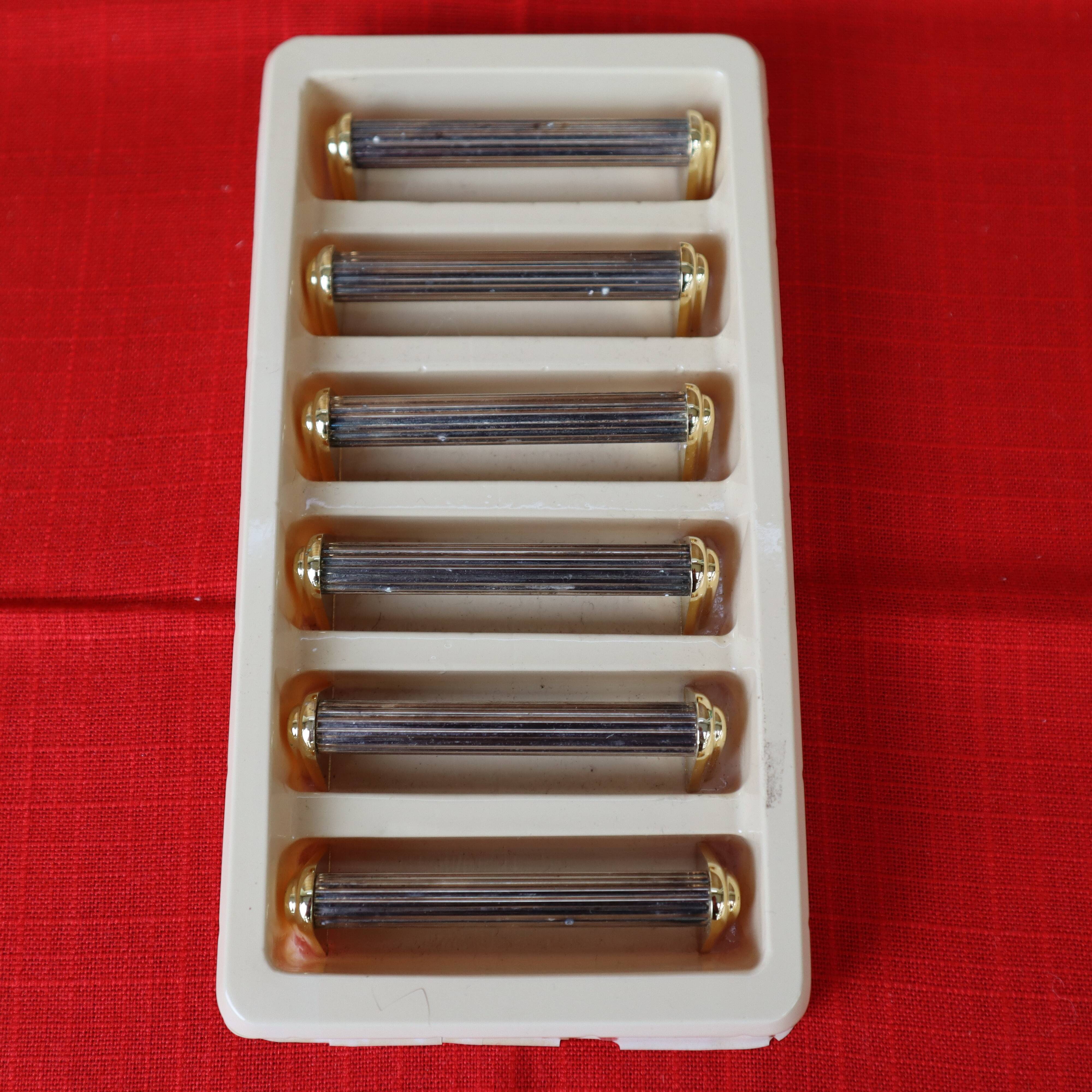 Set of 6 silver and gold metal knife holders