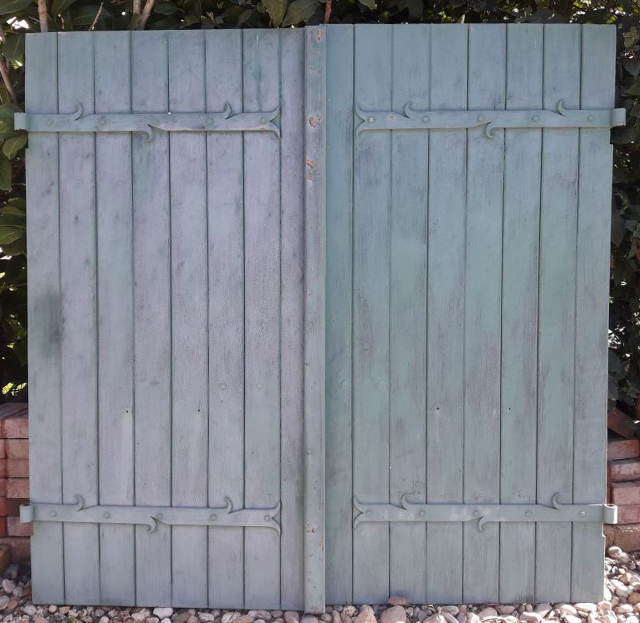 Pair of wooden iron hanging shutters