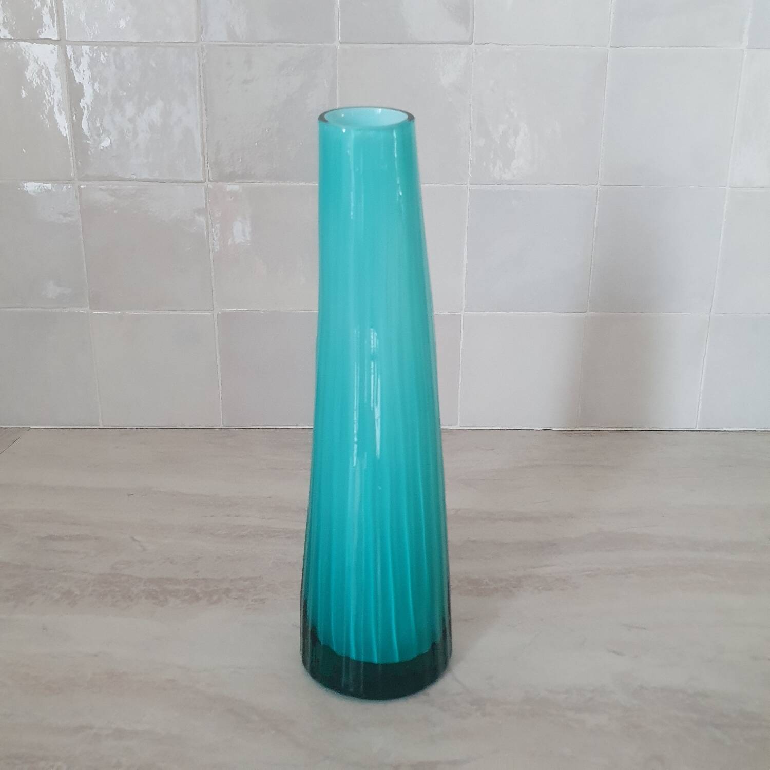 Curved turquoise blue blown glass soliflore vase
