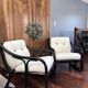 Set of two vintage black and white bamboo chairs.