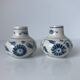 Pair of miniature blue and white Vietnamese ceramic vases with floral decoration.