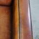 Art Deco design sheepskin leather armchair with a stunning patina