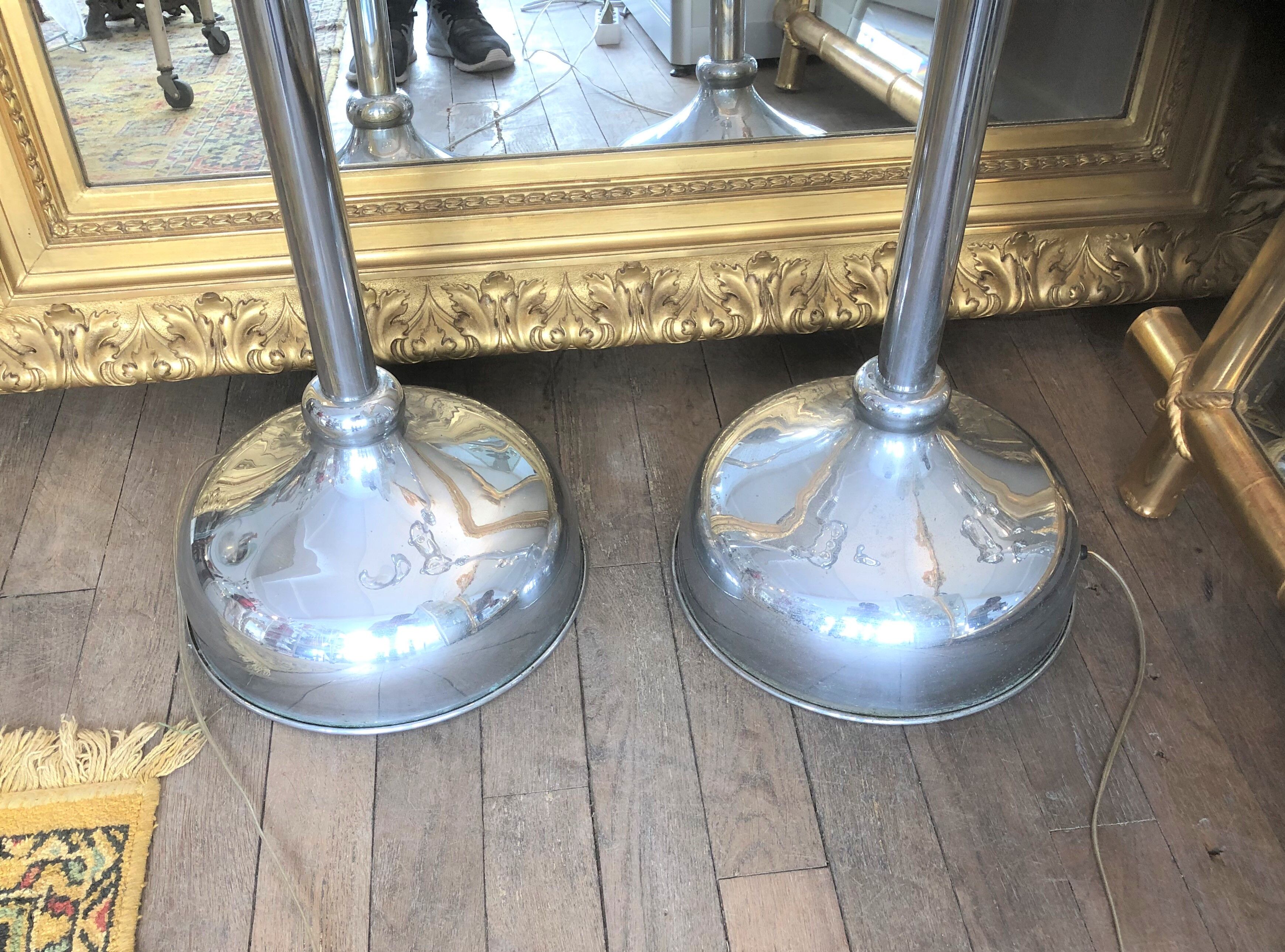 Pair of chrome metal flashlights, circa 1970, 8 lights, 160 cm