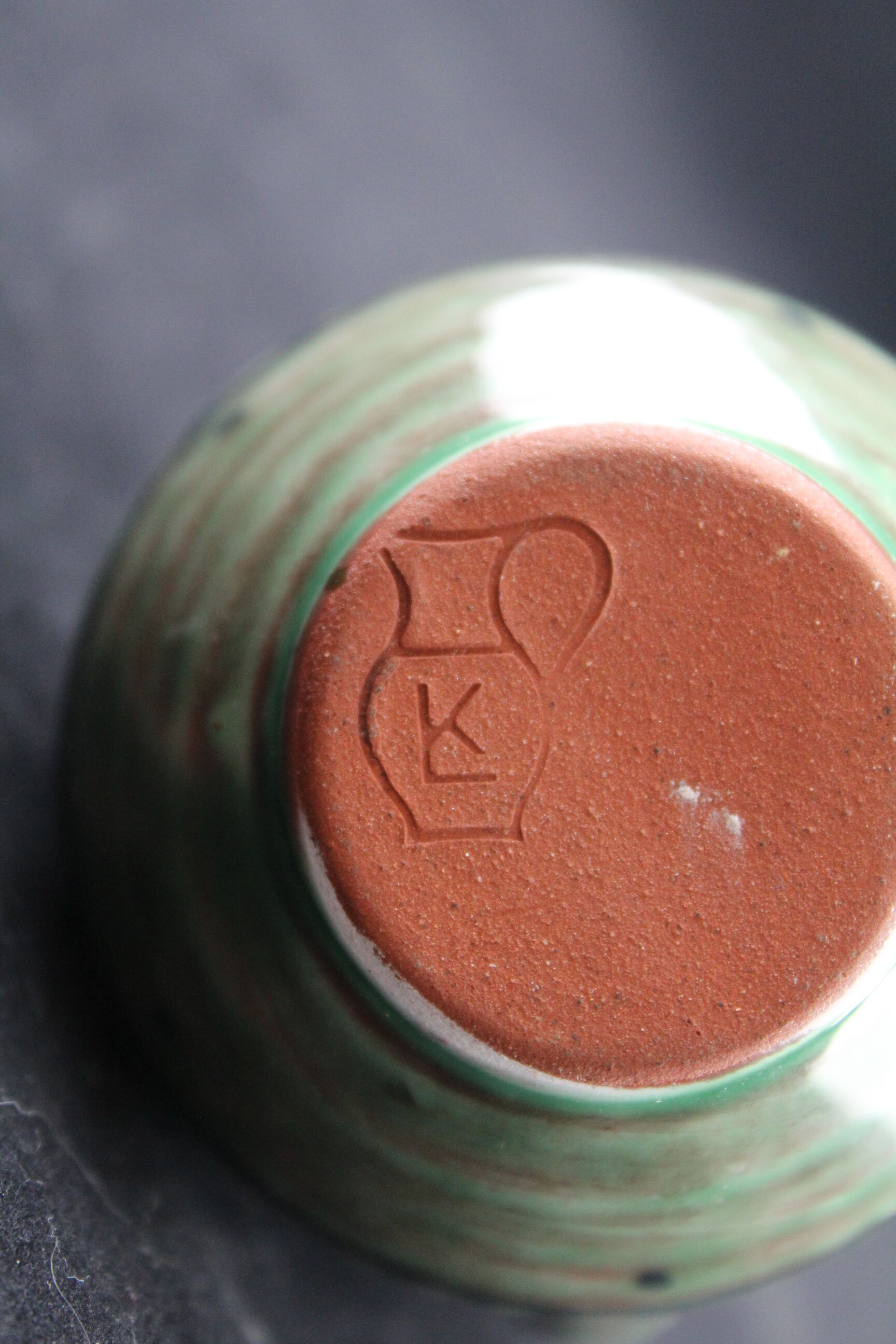 Single-stem vase signed "K" in ceramic