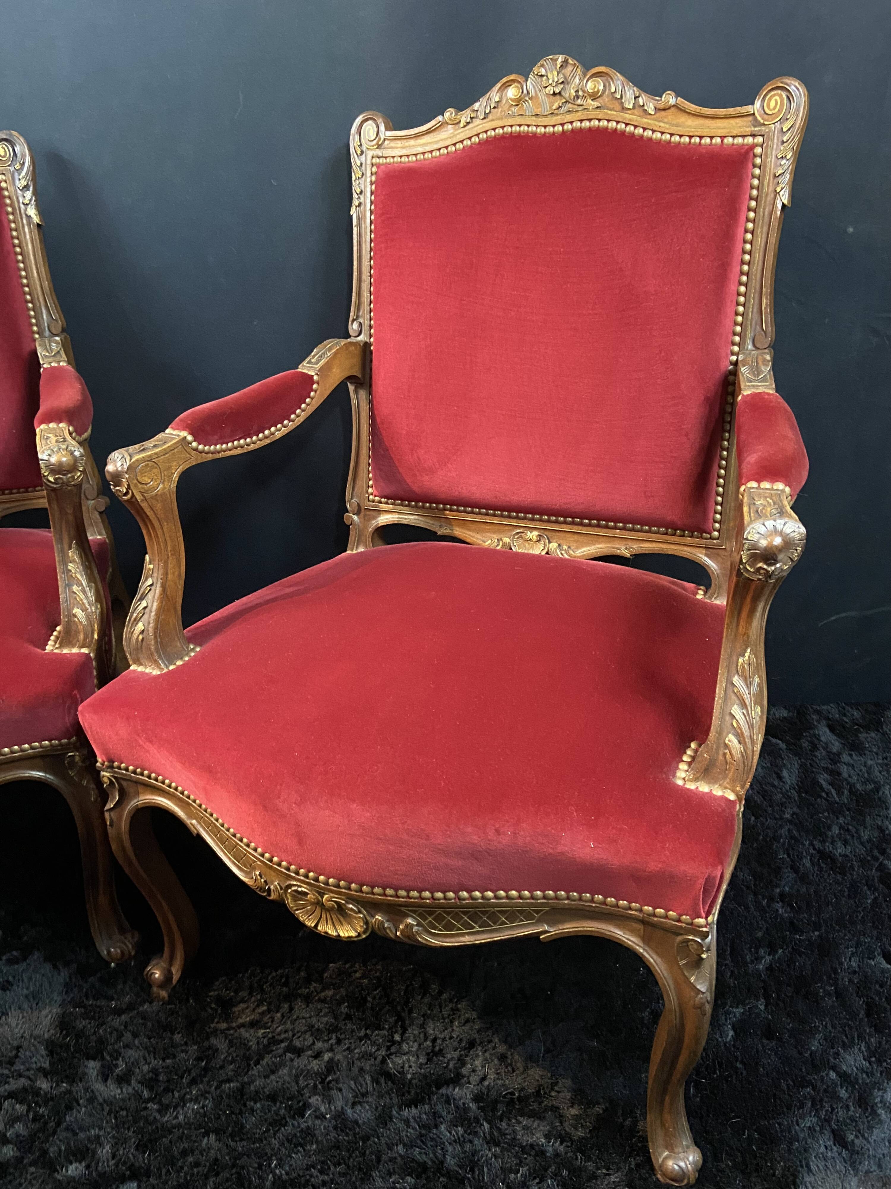 Pair of flat-back armchairs in Louis XV style in red velvet.