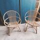 Paire de fauteuils coquille en rotin vintage 1960