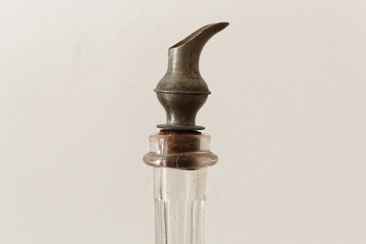 Chiseled glass rum bottle