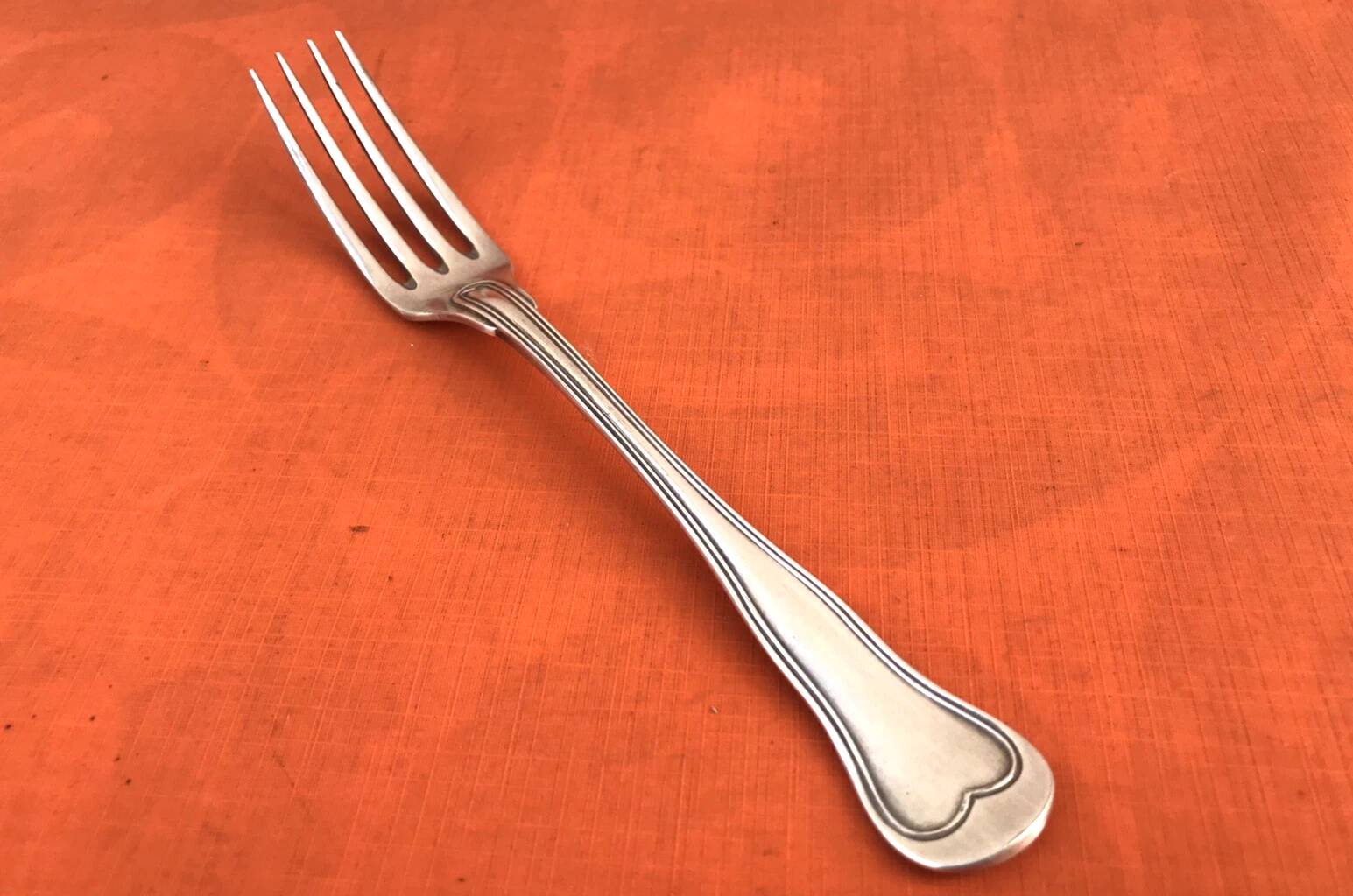 Antique dessert fork by silversmith Christofle, Chinon model collection.