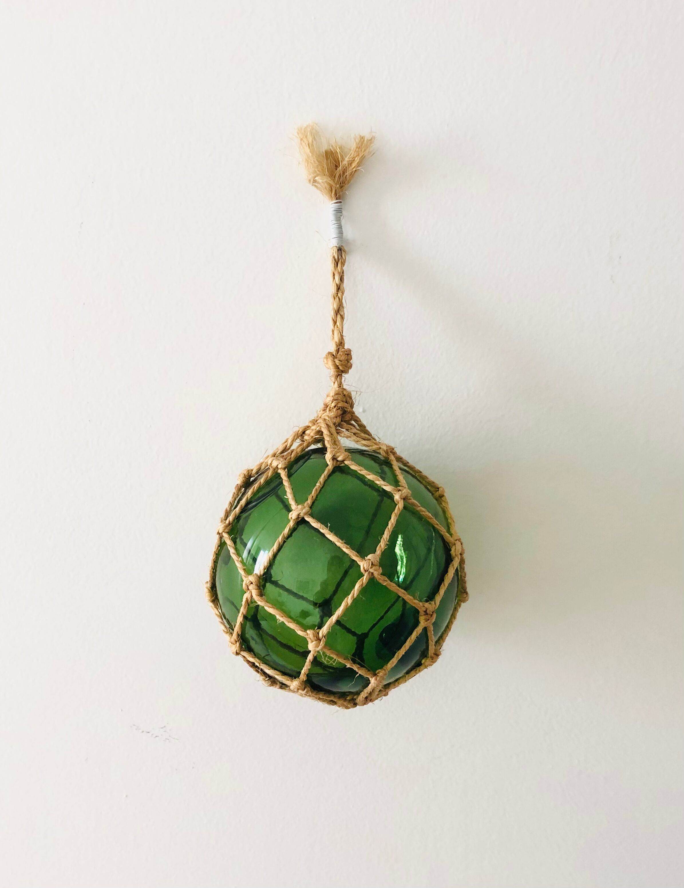 Pair of fishing floats and glass and rope