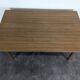 Modernist teak table with 2 extensions.