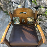 Pair of armchairs in stained wood and leather, 20th century