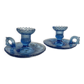 Paire de bougeoirs pouciers en verre