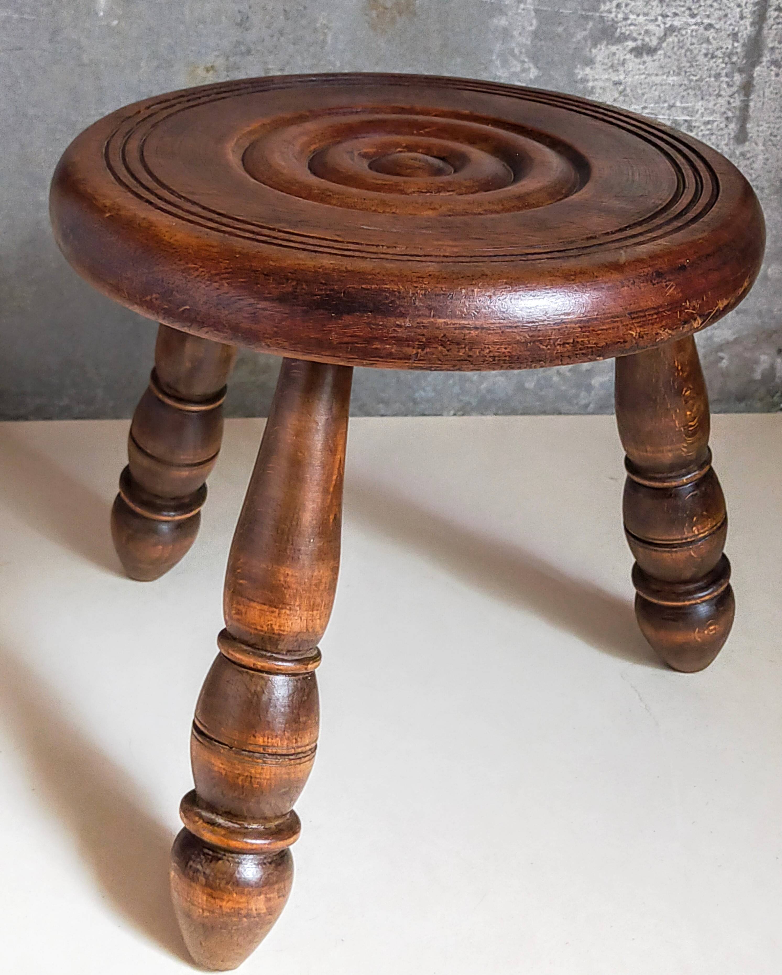 Low tripod stool in vintage turned solid wood
