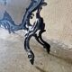 Spark screen, fire screen, bronze fireplace screen decorated with a covered cherub