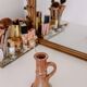 Set of two terracotta candle holders.