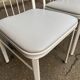 4 chaises en acier blanc et cuir gris