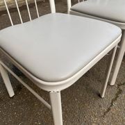 4 chairs in white steel and grey leather