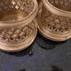 3 crystal decanters diamond cut set of 3 crystal decanters in a gold gold support,